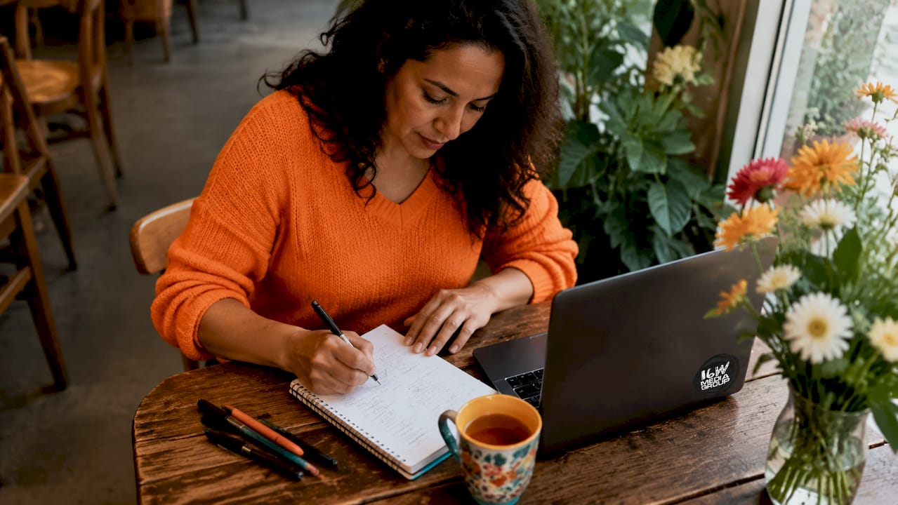 Woman planning promotional campaign at home