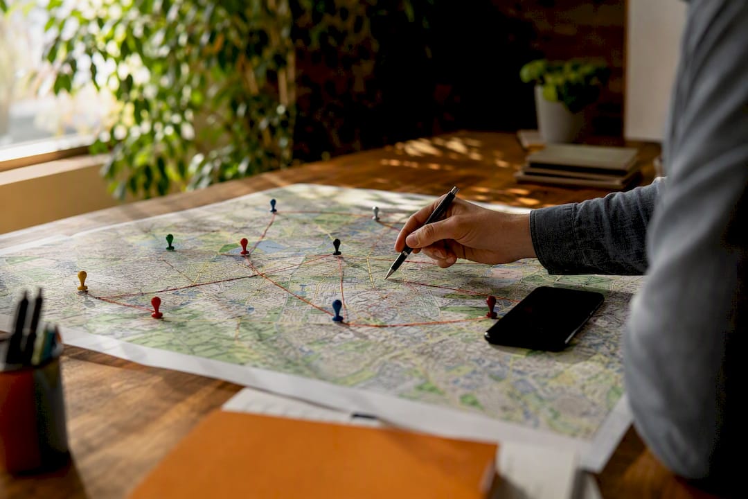 Map with location pins and strings for targeting